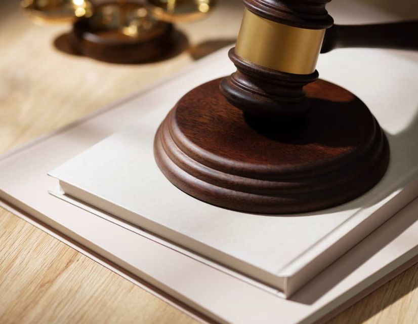 Gavel and legal documents on desk